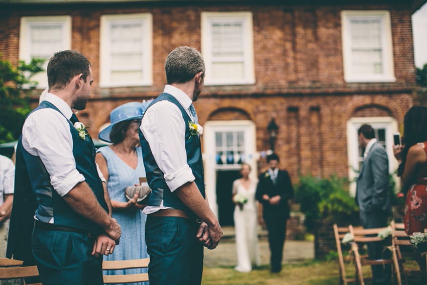 Bride walking down the aisle outdoors