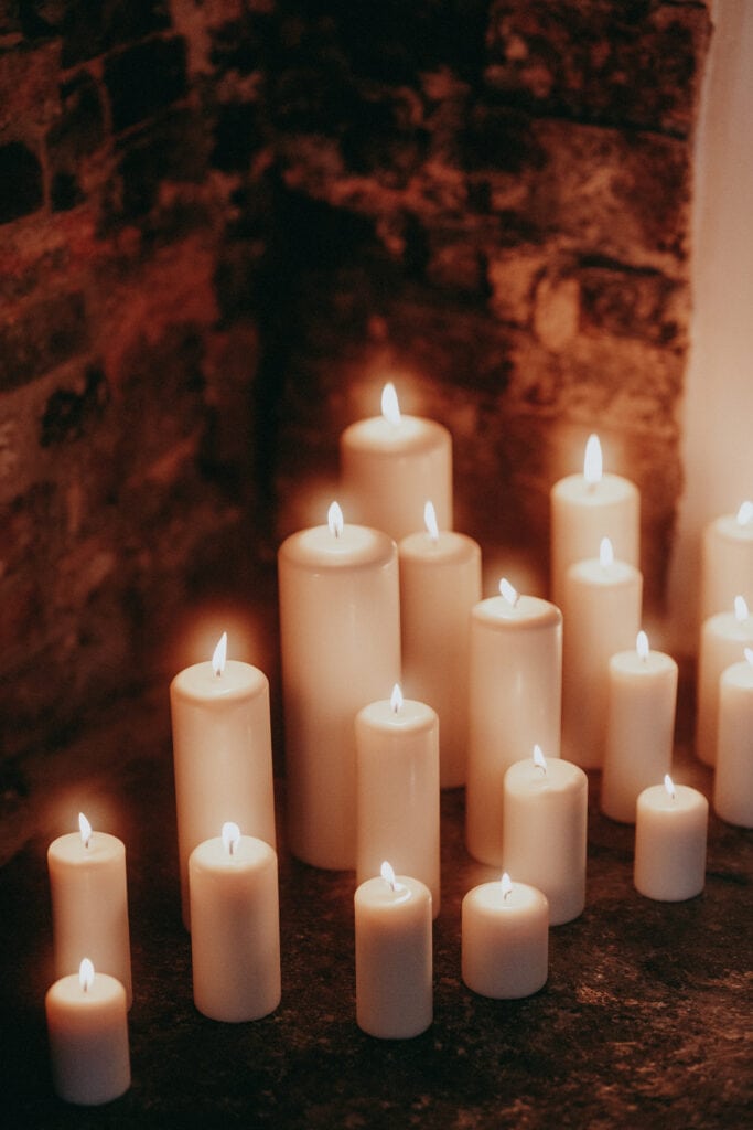 Candles at a winter wedding in Aswarby Rectory Wedding, Sleaford