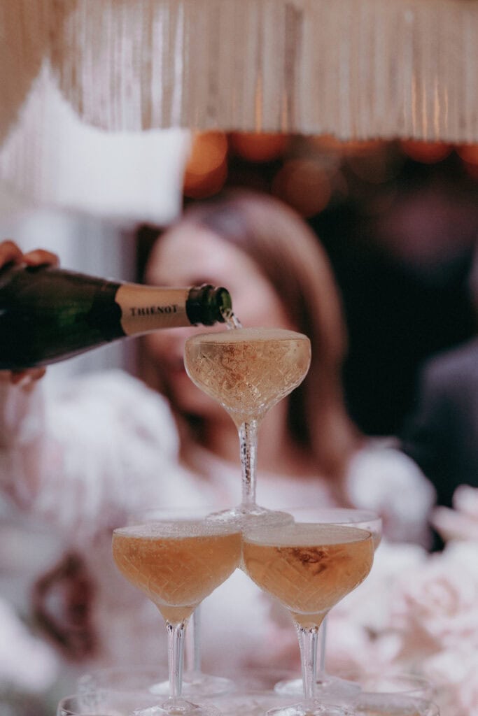 Champagne tower wedding photo