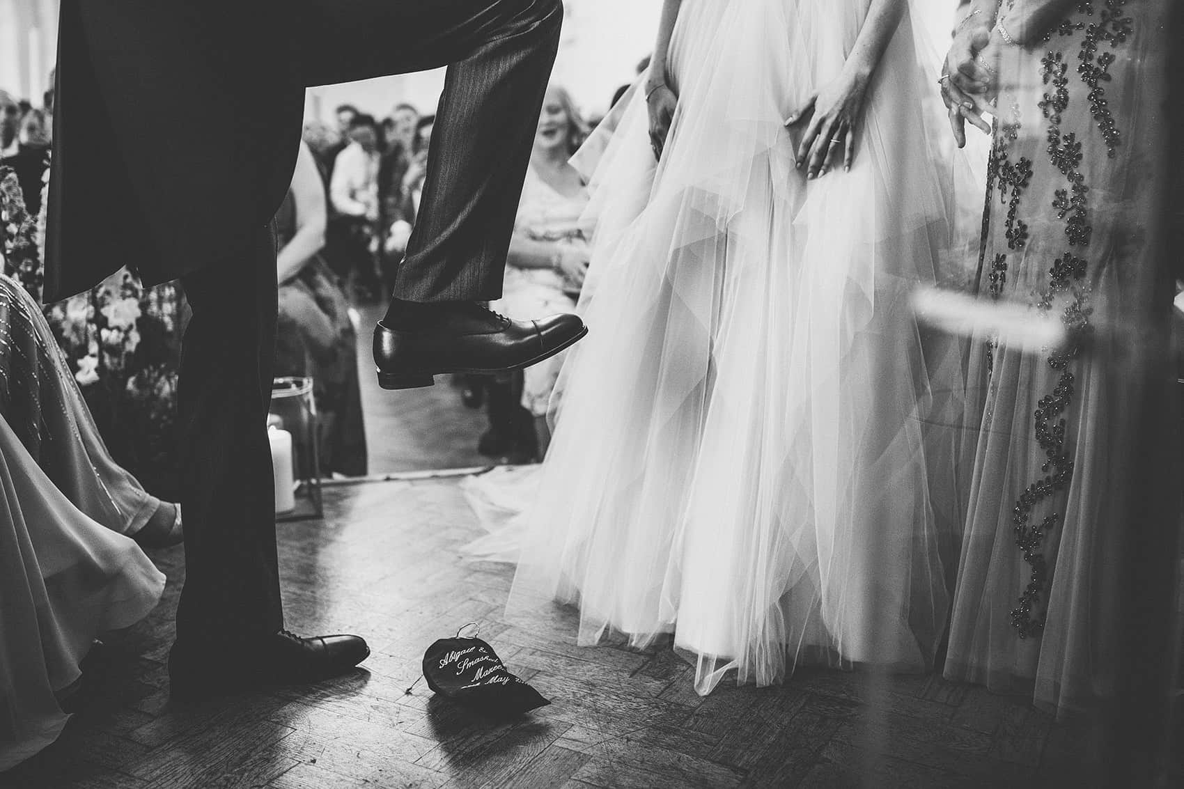 smashing the glass wedding picture